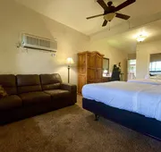 Lake View Queen Guest Room With Two Queens, Sleeper Sofa And Deck Overlooking Lake Ouachita. 1 Bedroom Hotel Room by RedAwning hotel detail image 4