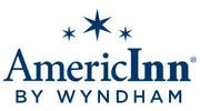 AmericInn by Wyndham Saint Ignace Lakefront hotel logo