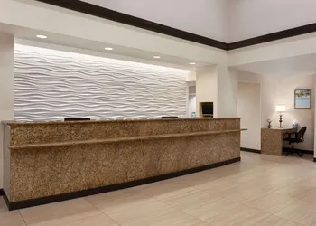 Ramada by Wyndham Suites Orlando Airport hotel thumbnail 3