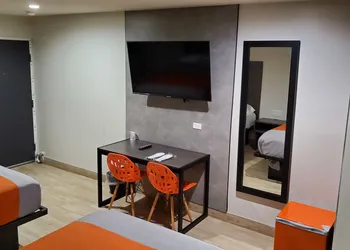 Exclusivo Inn & Suites hotel thumbnail 3