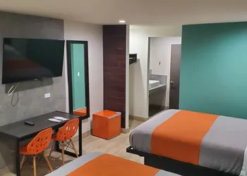 Exclusivo Inn & Suites hotel thumbnail 4