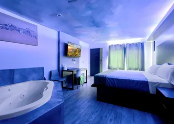 Exclusivo Inn & Suites hotel thumbnail 6