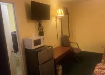 Economy INN poteau hotel thumbnail 2