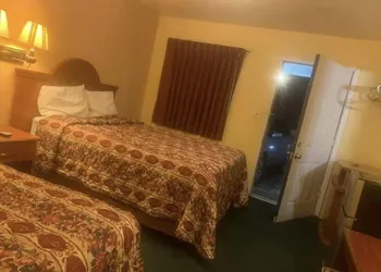 Economy INN poteau hotel thumbnail 3