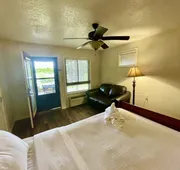Lake View Queen Guest Room With Two Queens, Sleeper Sofa And Deck Overlooking Lake Ouachita. 1 Bedroom Hotel Room by RedAwning hotel detail image 3