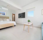 Room 16: Grand King Suite w/ Desk & Sofa Bed hotel detail image 7