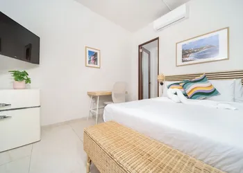 Room 13: Breezy Veranda Stay w/ City Views hotel thumbnail 7