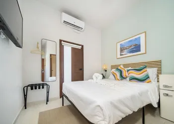 Room 12: Sunlit Balcony Stay Near Calle Cerra hotel thumbnail 3