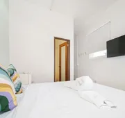 Room 12: Sunlit Balcony Stay Near Calle Cerra hotel detail image 4